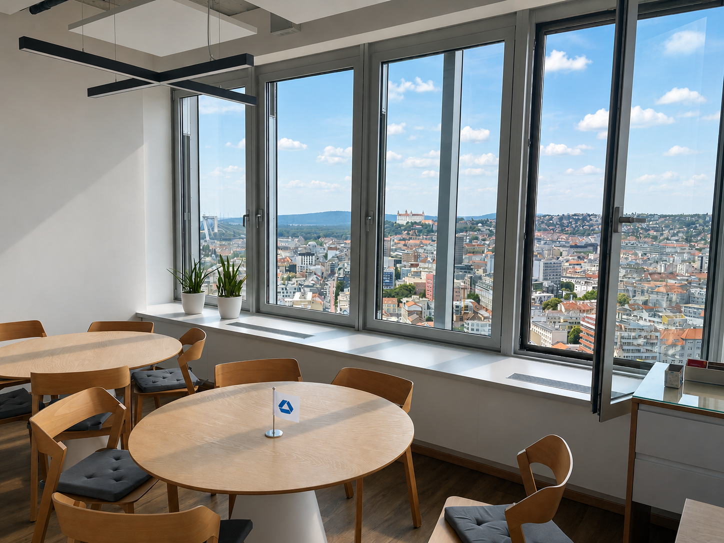 Meeting room — east-facing windows, Bratislava skyline
